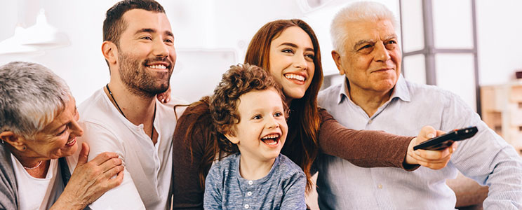 Family of 5 Watching Television