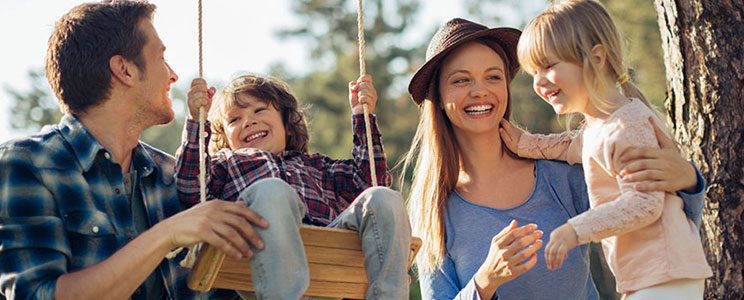 Family of Four Enjoying an Afternoon Outside